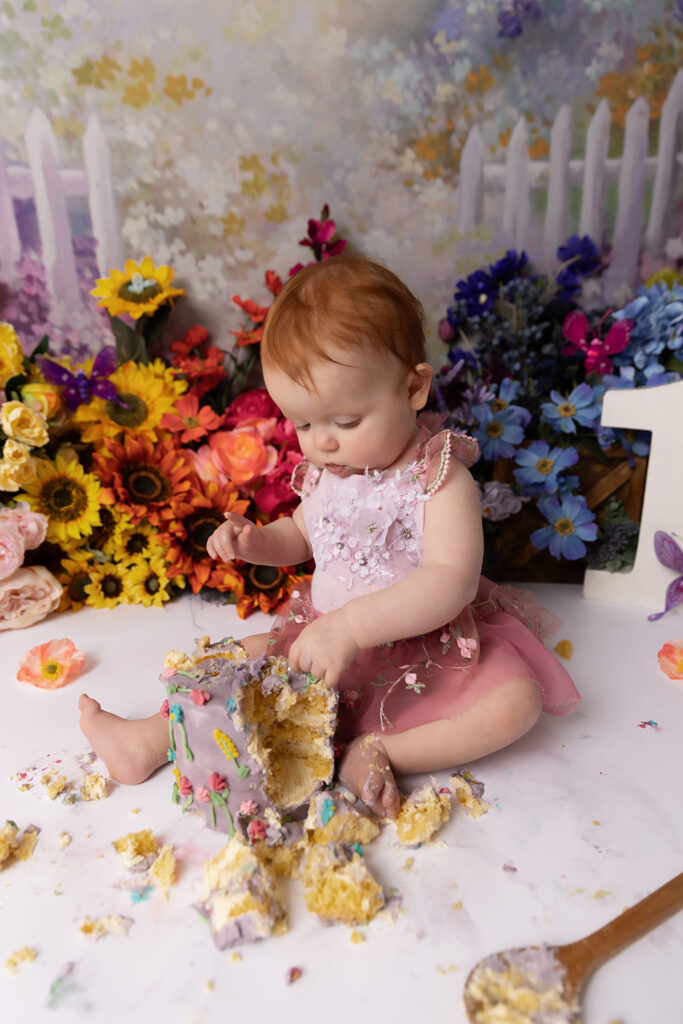 cake-smash-photographer-romsey-studio-garden-party-birthday-first-birthday-girl.jpg